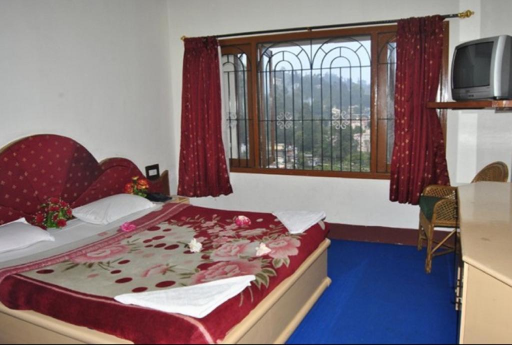 Hotel Ruby International Кодайканал Стая снимка